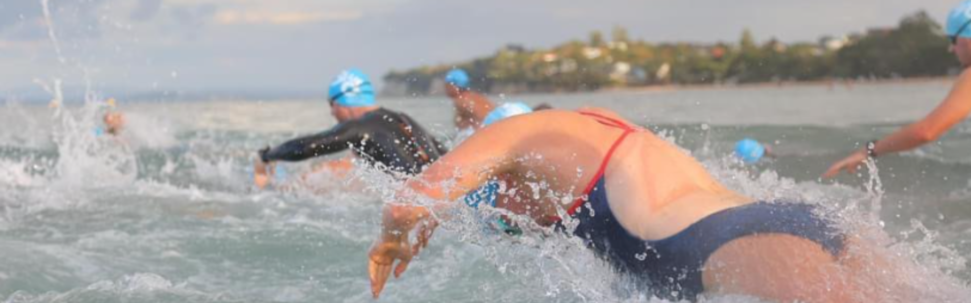 How can equipment help your open water swimming?