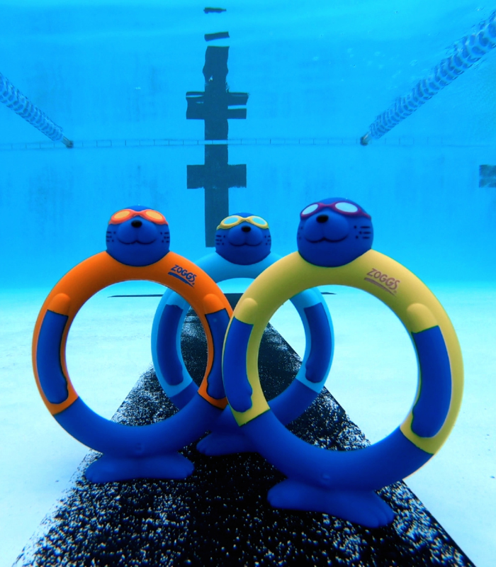 dive rings under water on the bottom of the pool